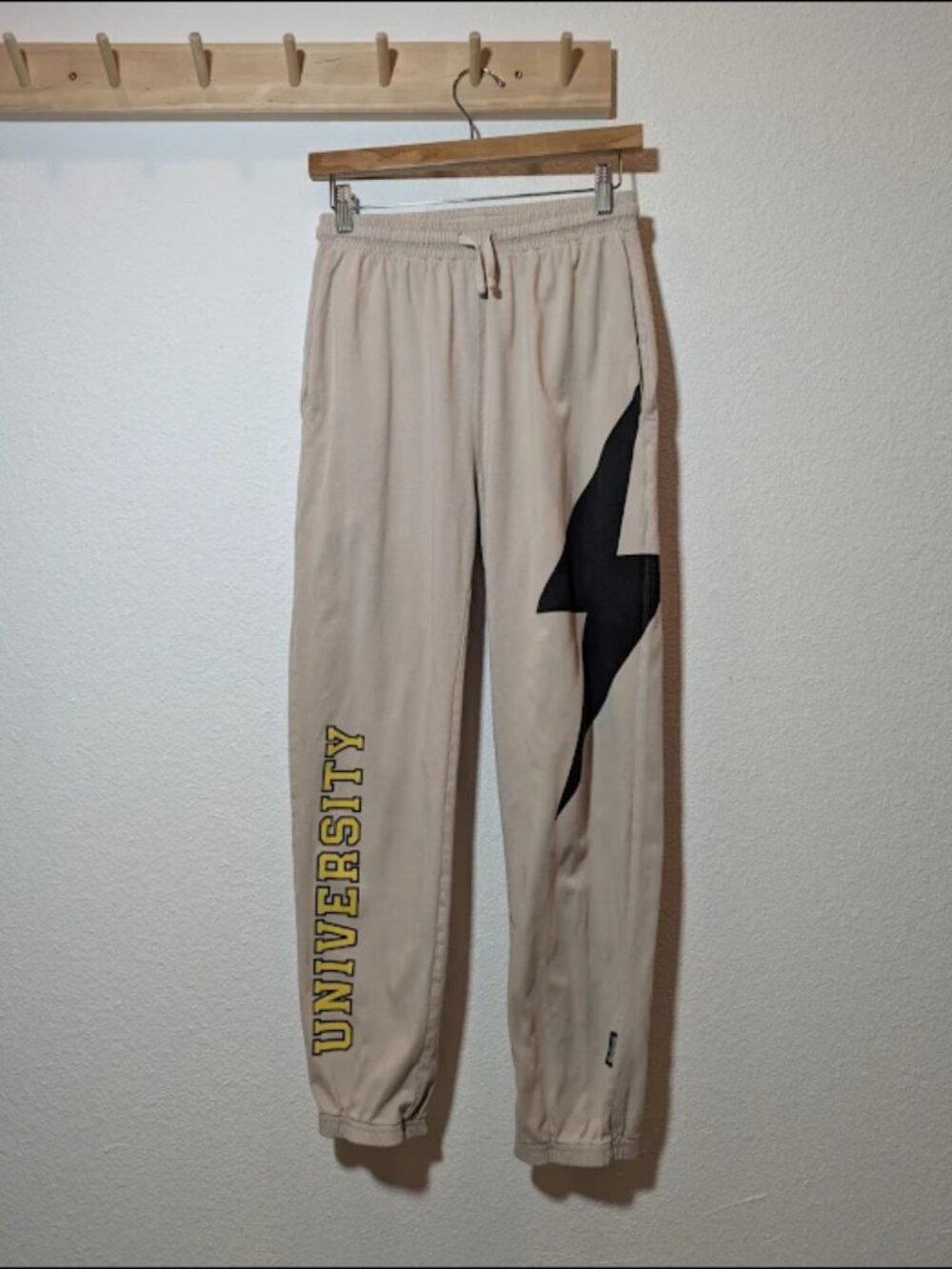 Nununu light baggy pants lightening bolt and university